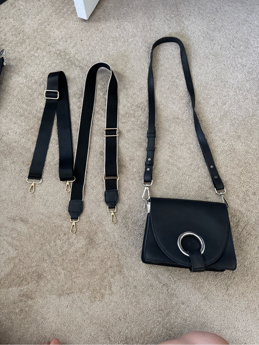 Black Crossbody Bag with Silver Ring Accent and Adjustable Straps